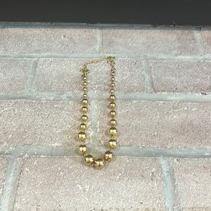 Gold hall necklace